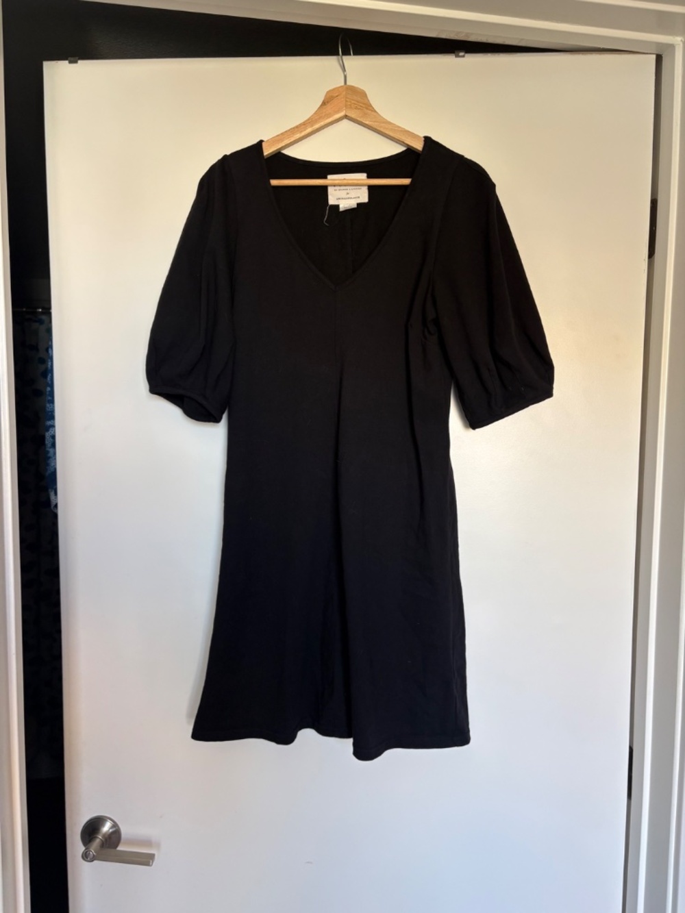 Cute short black dress with puffed sleeves